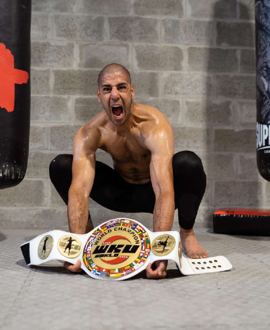 Youness Benmalek, ceinture de champion du monde WKU